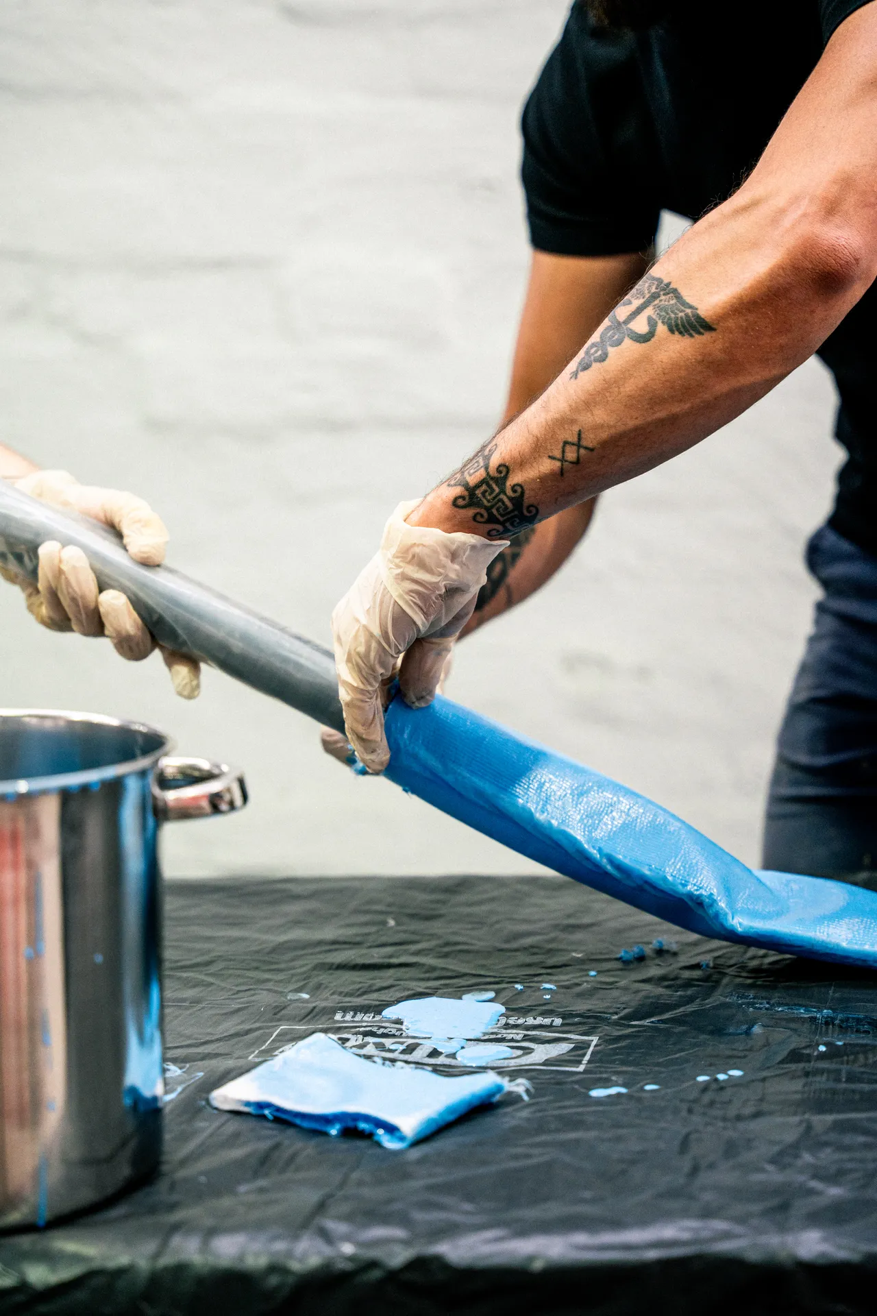 Epoxy resin being worked into a relining liner